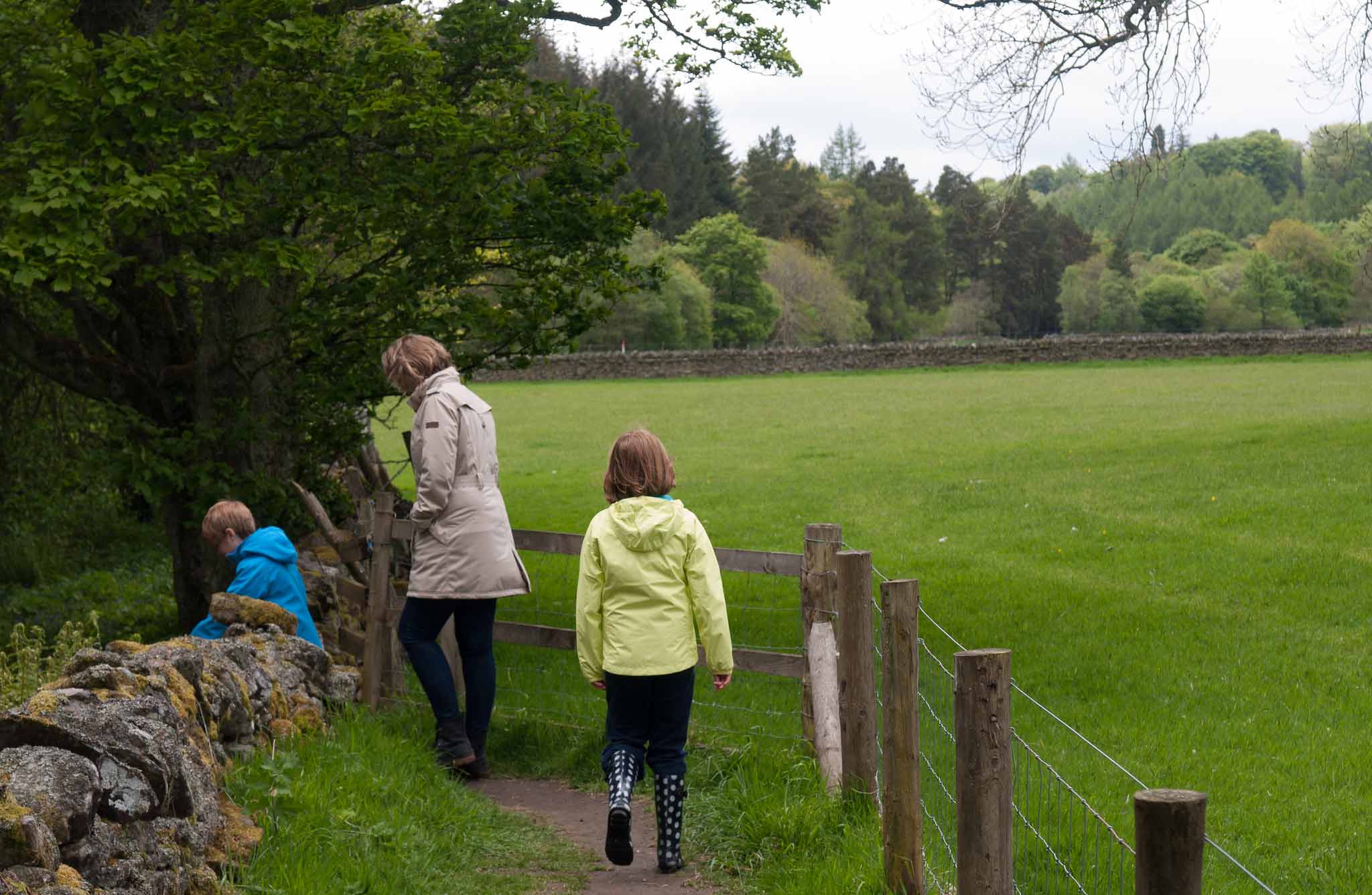 Family on a footpath in Blanchland, Northumberland